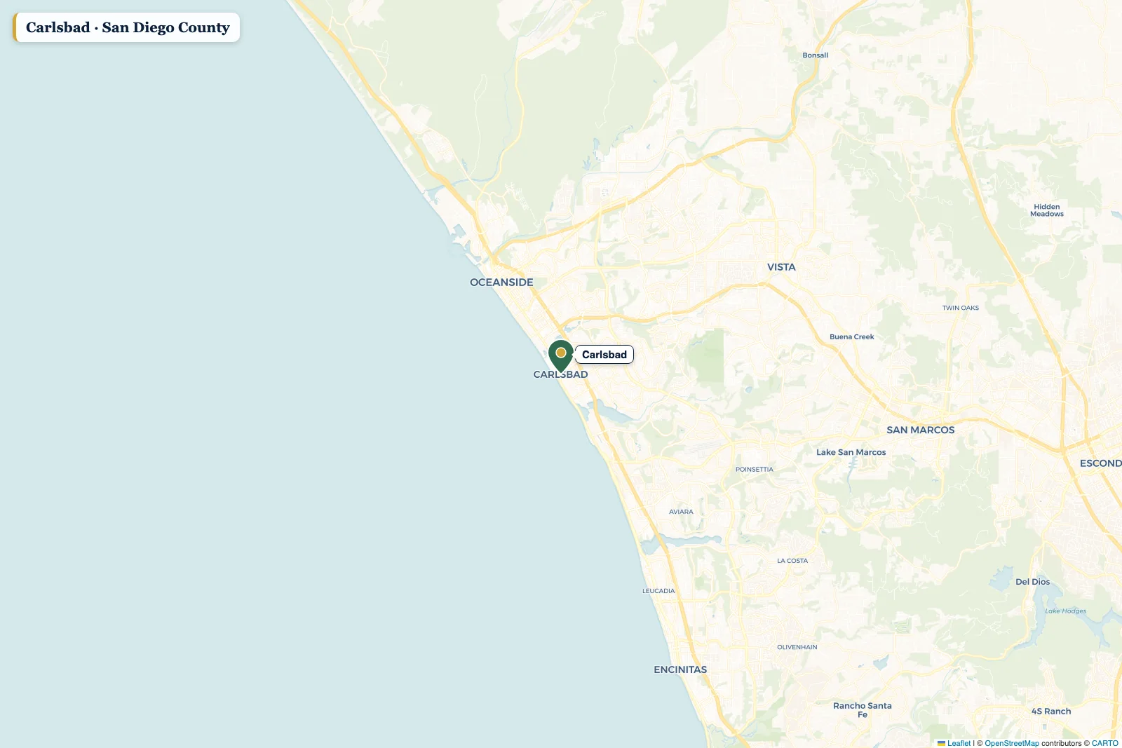 Map of San Diego County with a pin on Carlsbad
